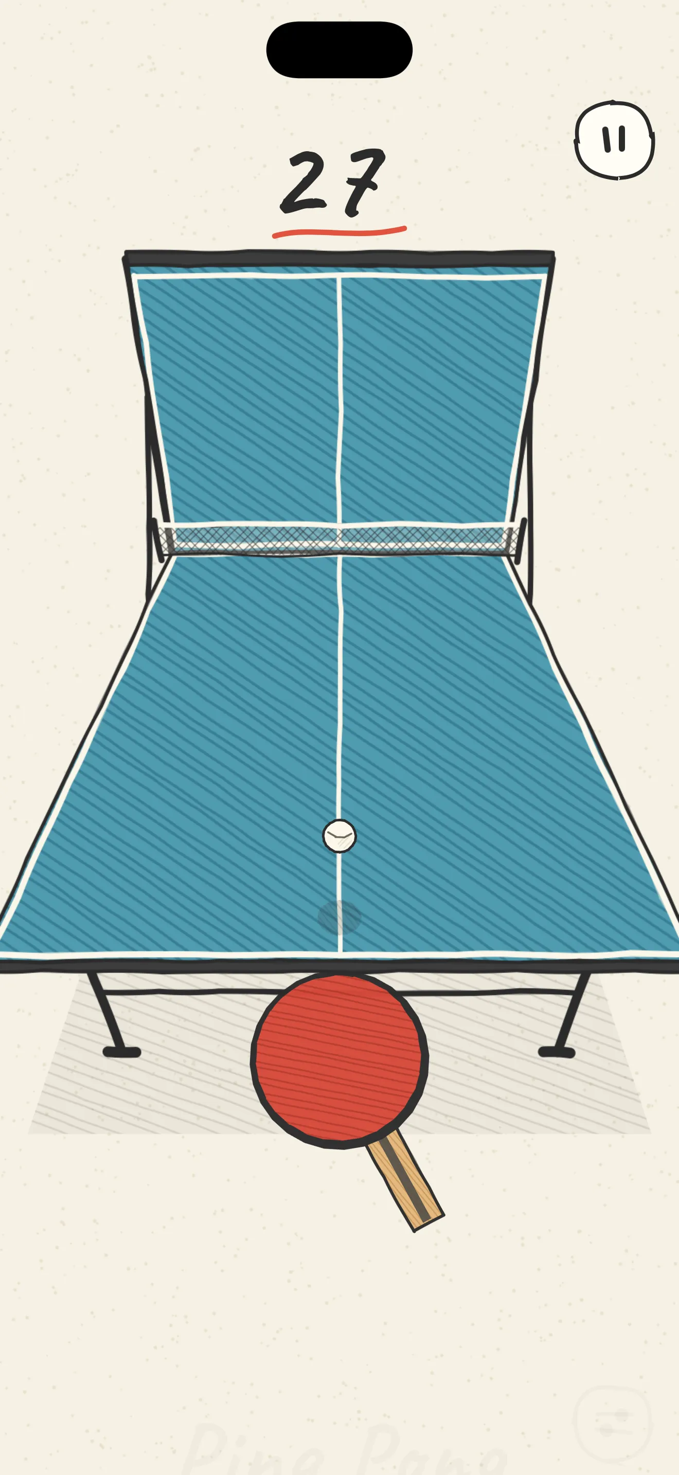 A rally on the folded table: the ball rises off the red paddle toward the upright half, score 27